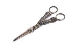 A mid-Victorian silver Queens pattern grape scissors.