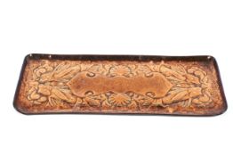 A Newlyn Arts and Crafts copper rectangular tray with fish decoration.
