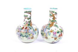 A pair of 20th century Chinese porcelain bottle vases.