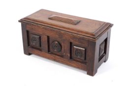 An oak apprentice 18th century style panelled coffer with rising lid.