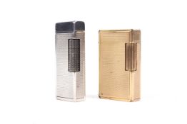 A Dunhill (Swiss) Rollagas silver-plated cigarette lighter and a Dupont (Paris) gilt lighter.