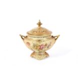 A late 19th century Royal Worcester blush ivory ground two-handled pot-pourri vase and cover.