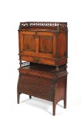 An early 20th century stained oak two section bureau.