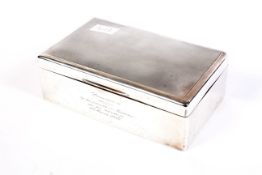 A silver cigar box.