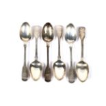 A set of six Victorian silver fiddle pattern dessert spoons with script initials.