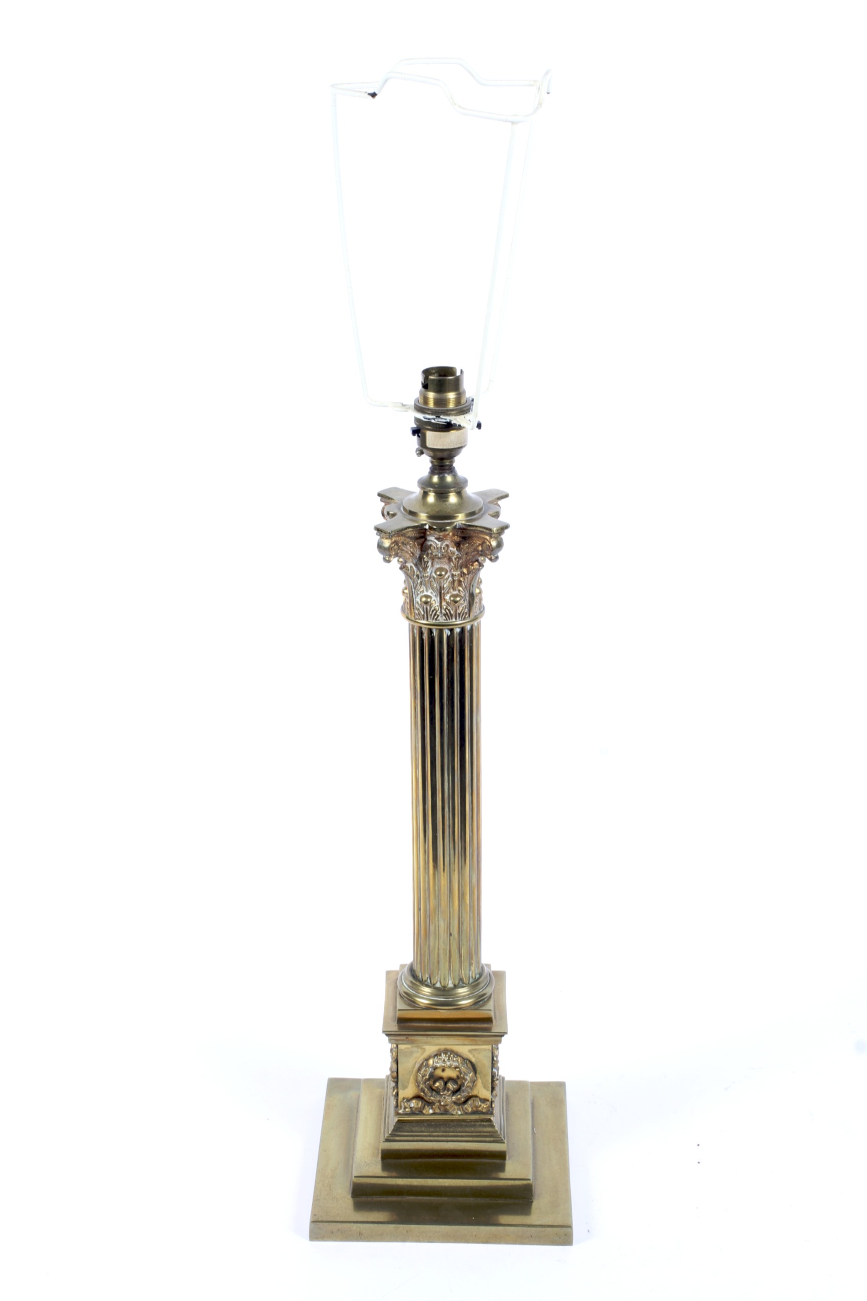 A brass Corinthian column lamp base.