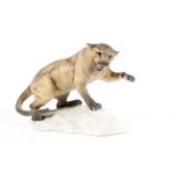 A Beswick pottery model of a puma on rockwork.