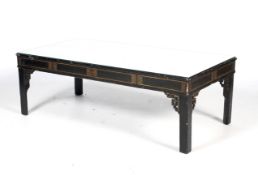A 20th century chinoiserie glass topped coffee-table.