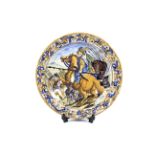 An Italian maiolica 19th century charger in the Castelli style.