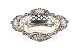 A silver pierced and shaped-oval sweet dish.