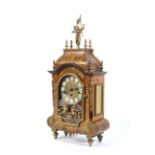 A Louis XV style German (Franz Hermle & Sons) gilt-metal mounted mantel clock.