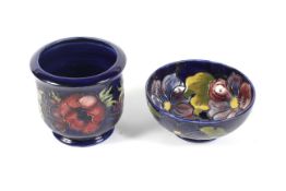 A Moorcroft blue ground Anemone pattern bowl and a planter.