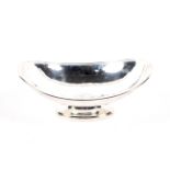 A silver hammered oval pedestal bowl.