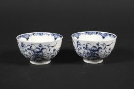 A pair of Worcester porcelain blue and white tea bowls, circa 1775.
