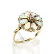 A vintage gold, opal and diamond flower-head cluster ring.