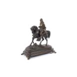 A late 19th century Continental bronze figure of a knight on horseback.