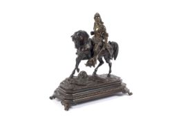 A late 19th century Continental bronze figure of a knight on horseback.