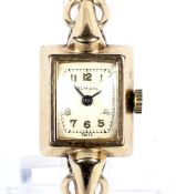Admiral, a lady's 9ct gold rectangular bracelet watch, circa 1951.