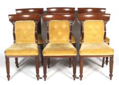 A set of six William IV mahogany framed upholstered dining chairs.