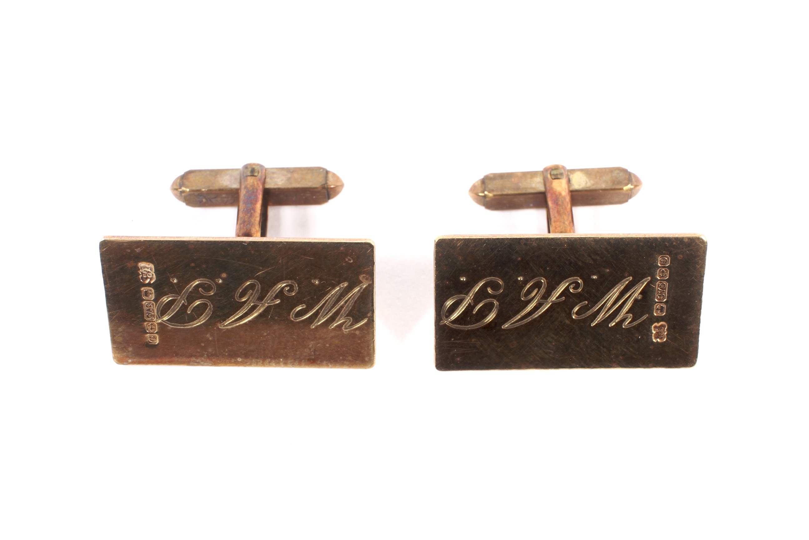 A pair of 9ct gold baton-twist and rectangular panel cufflinks.