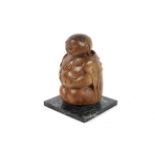 A vintage carved wooden seated Buddha on marble base,