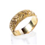 A late Victorian 9ct gold broad wedding band.