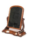 A Victorian mahogany arched top table dressing table swing mirror.