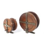 Two wooden 'Nottingham' style reels.