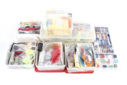 A large quantity of fly tying materials stored in air tight/custom containers.