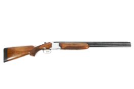 A Laurona 12 Gauge over and under shotgun. Double trigger, non ejector, 26 inch barrels, 2.