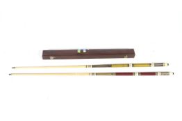 Two pool cues. Both made in Taiwan, one in case complete with chalks and spare tip, etc, 146cm.