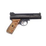 Webley 'Mark 1.22' with customised wooden grips plus leather hoister, from 1946-1964.