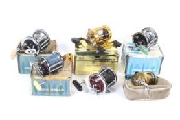 A collection of 6 Penn fishing reels.