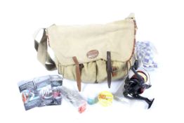 A Shakespeare fishing shoulder bag with contents.