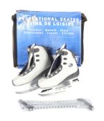 Pair of CCM recreational ice skates. Size 5, blades may require attention.