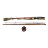 A Hardy two piece fishing rod and a Hardy's brass and wooden fishing reel with ratchet, circa 1950.