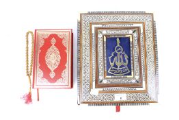 A Middle Eastern inlaid marquetry Quran gift box and contents.