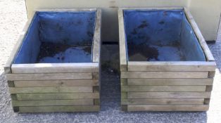 A pair of rectangular hutton wooden planters.