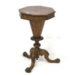 A Victorian burr walnut trumpet sewing table.