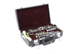 A cased clarinet by DY Musical Design USA.