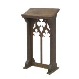 A Victorian carved oak lectern.