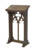 A Victorian carved oak lectern.