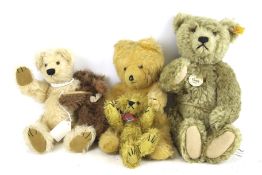 Five 20th century teddy bears.