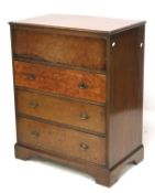 A continental burr walnut veneered secretaire desk.