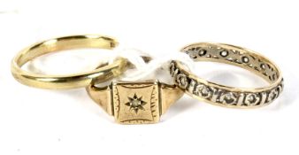 Three 9ct gold and yellow metal rings. Including a signet ring, 5.