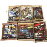 A large collection of assorted playworn diecast model vehicles.