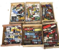 A large collection of assorted playworn diecast model vehicles.