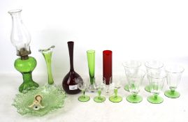 A collection of assorted vintage coloured glassware.