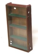 A 20th century stained wood, glass fronted display case.