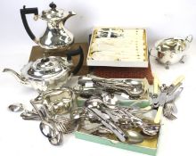 Assorted silver handled and plated flatware and a four piece oval tea service.